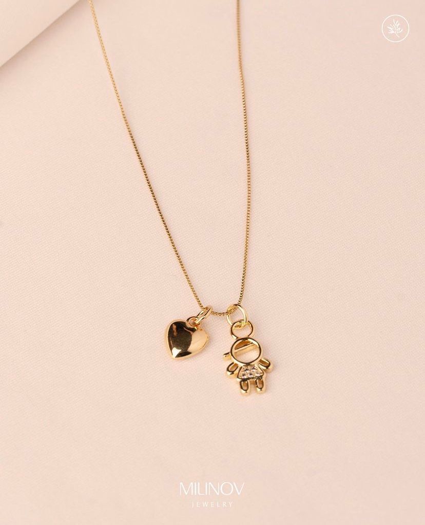Dijes en cobre con enchape oro 18k